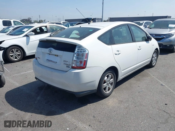 2006 Toyota Prius with VIN JTDKB20UX67527206, listed as a IAAI auction lot 42093925 with 124,256 mi miles. Bid and sale history available at carsss.com. Image 4.