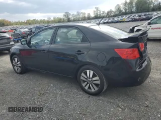 2013 Kia Forte EX with VIN KNAFU4A25D5704903, listed as a Copart auction lot 75198944 with 130,479 mi miles and Salvage Title. Bid and sale history available at carsss.com. Image 2.