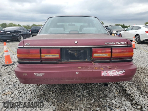 1991 Toyota Camry DLX z VIN 4T1SV21E0MU450578, wystawiony jako Copart lot #73990024 z przebiegiem 149 342 mil mil oraz Czysty tytuł • Clean title. Historia ofert i sprzedaży dostępna na DreamBid. Obrazek 6.