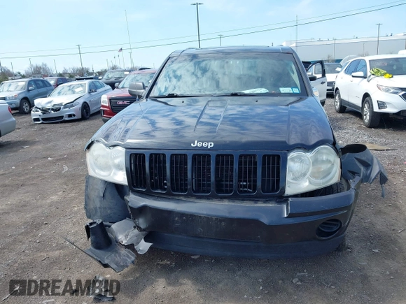 2008 Jeep Grand Cherokee Laredo with VIN 1J8GR48K48C119836, listed as a IAAI auction lot 42114083 with 129,352 mi miles. Bid and sale history available at carsss.com. Image 12.