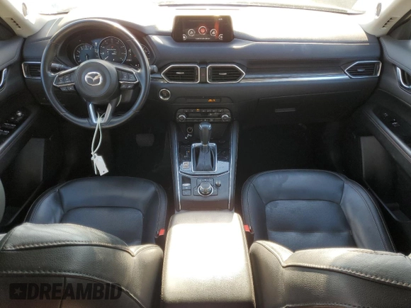 2019 Mazda CX-5 Grand Touring with VIN JM3KFBDM0K0571806, listed as a Copart auction lot 43395105 with 57,768 mi miles and Salvage Title. Bid and sale history available at carsss.com. Image 8.