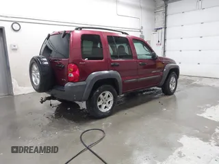 2002 Jeep Liberty Sport with VIN 1J4GL48K72W115630, listed as a IAAI auction lot 41973816 with 154,220 mi miles. Bid and sale history available at carsss.com. Image 4.