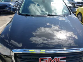 2019 GMC Acadia SLE with VIN 1GKKNKLA0KZ195451, listed as a IAAI auction lot 42026503 with 67,964 mi miles. Bid and sale history available at carsss.com. Image 6.