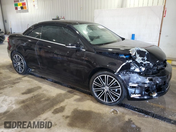 2014 Volkswagen Eos Komfort with VIN WVWBW8AH8EV000316, listed as a Copart auction lot 52208485 with 124,338 mi miles and Salvage Title. Bid and sale history available at DreamBid. Image 4.