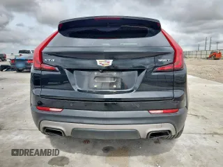 2020 Cadillac XT4 FWD Premium Luxury with VIN 1GYFZCR40LF073517, listed as a Copart auction lot 60121635 with 79,450 mi miles and Salvage title. Bid and sale history available at DreamBid. Image 6.