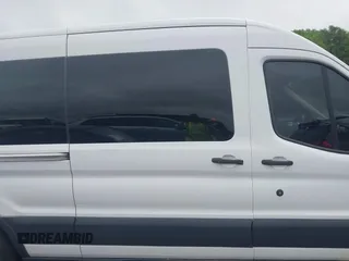 2018 Ford Transit Passenger XL z VIN 1FBAX2CM2JKA31397, wystawiony jako IAAI lot #42252424 z przebiegiem 72 434 mil mil oraz . Historia ofert i sprzedaży dostępna na DreamBid. Obrazek 13.