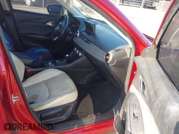 2019 Mazda CX-3 Grand Touring with VIN JM1DKFD71K0427650, listed as a IAAI auction lot 42058069 with 67,688 mi miles and . Bid and sale history available at DreamBid. Image 5.