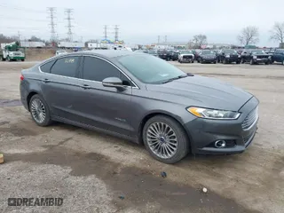 2013 Ford Fusion Titanium Hybrid with VIN 3FA6P0RU5DR289612, listed as a IAAI auction lot 41903288 with 168,661 mi miles. Bid and sale history available at carsss.com. Image 1.