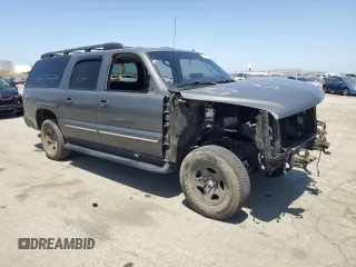 2002 Chevrolet Suburban LT with VIN 1GNFK16T32J242667, listed as a Copart auction lot 57413185 with Not provided miles and Salvage title. Bid and sale history available at DreamBid. Image 4.