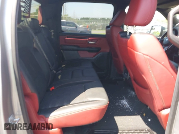 2019 Ram 1500 Rebel with VIN 1C6SRFLT8KN797618, listed as a IAAI auction lot 42556663 with 92,606 mi miles and . Bid and sale history available at DreamBid. Image 8.