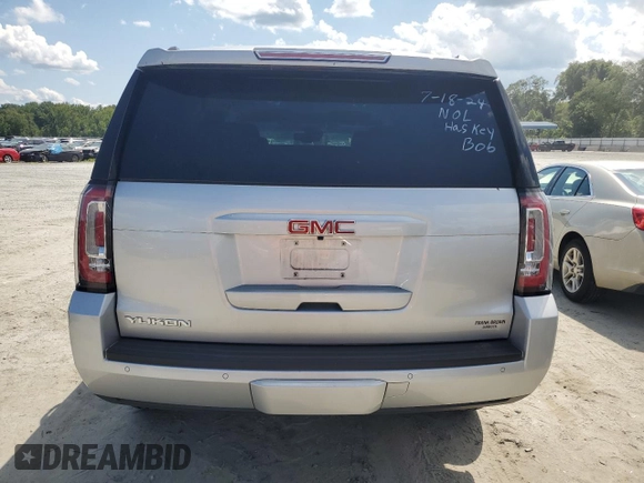 2016 GMC Yukon SLT with VIN 1GKS1BKC1GR413225, listed as a Copart auction lot 66547034 with 56,073 mi miles and Salvage Title. Bid and sale history available at carsss.com. Image 6.