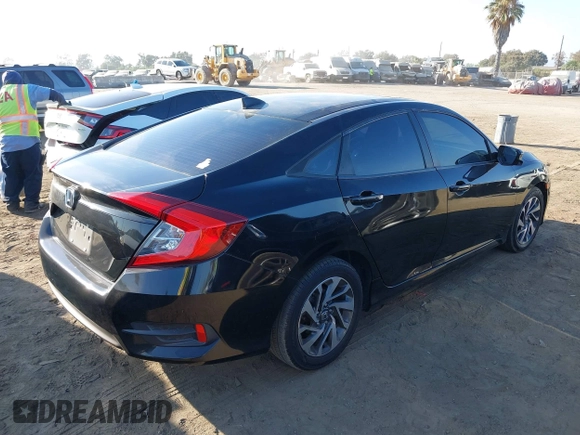 2017 Honda Civic EX z VIN 2HGFC2F75HH519233, wystawiony jako IAAI lot #40375565 z przebiegiem 133 660 mil mil oraz . Historia ofert i sprzedaży dostępna na DreamBid. Obrazek 4.