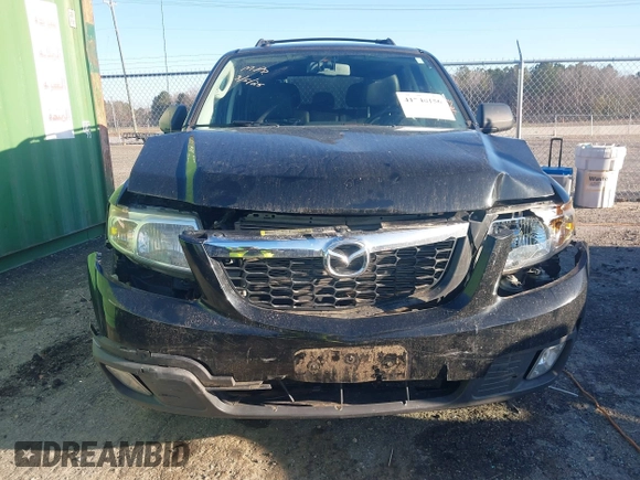2010 Mazda Tribute Sport with VIN 4F2CY9C74AKM03679, listed as a IAAI auction lot 41740156 with 142,208 mi miles and . Bid and sale history available at DreamBid. Image 12.
