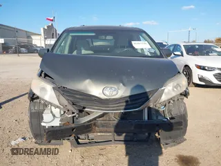 2012 Toyota Sienna LE with VIN 5TDJK3DCXCS039801, listed as a IAAI auction lot 41483248 with 165,548 mi miles. Bid and sale history available at carsss.com. Image 12.
