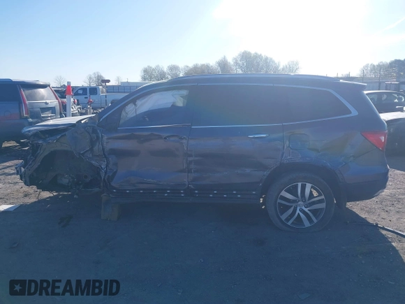 2017 Honda Pilot Touring with VIN 5FNYF5H97HB023919, listed as a IAAI auction lot 41864959 with 70,360 mi miles. Bid and sale history available at carsss.com. Image 14.