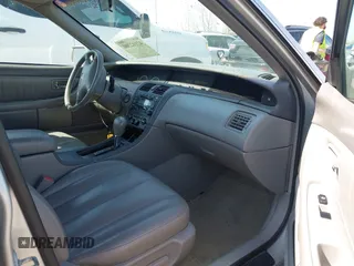 2002 Toyota Avalon XL with VIN 4T1BF28B52U265710, listed as a IAAI auction lot 42102300 with 99,901 mi miles and . Bid and sale history available at DreamBid. Image 5.