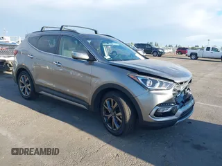 2018 Hyundai Santa Fe Ultimate z VIN 5XYZW4LA1JG515019, wystawiony jako IAAI lot #42248389 z przebiegiem 60 222 mil mil oraz . Historia ofert i sprzedaży dostępna na DreamBid. Obrazek 1.