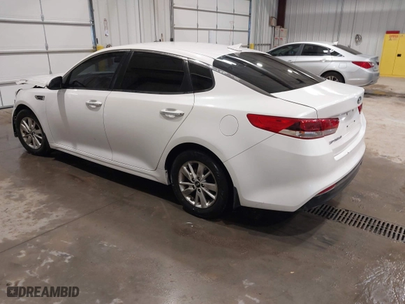 2016 Kia Optima LX with VIN KNAGT4L30G5072605, listed as a IAAI auction lot 41562330 with 152,320 mi miles. Bid and sale history available at carsss.com. Image 3.
