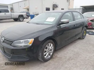 2014 Volkswagen Jetta Sedan SE w/Connectivity with VIN 3VWD07AJ3EM429815, listed as a IAAI auction lot 41288078 with 145,279 mi miles. Bid and sale history available at carsss.com. Image 2.
