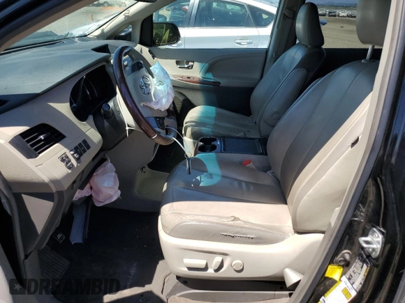 2012 Toyota Sienna XLE AAS z VIN 5TDYK3DC0CS259964, wystawiony jako Copart lot #55964505 z przebiegiem 161 119 mil mil oraz Szkoda całkowita • Salvage title. Historia ofert i sprzedaży dostępna na DreamBid. Obrazek 7.