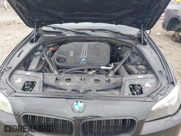 2014 BMW 5 Series 535d with VIN WBAXA5C51ED691018, listed as a IAAI auction lot 41887112 with 174,684 mi miles and . Bid and sale history available at carsss.com. Image 10.
