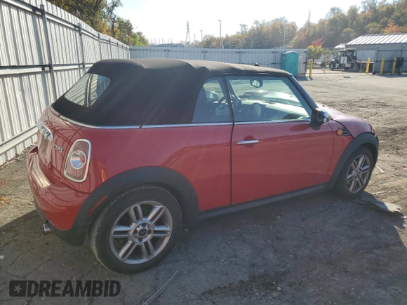 2013 MINI Convertible with VIN WMWZN3C58DT265980, listed as a Copart auction lot 77157154 with 88,975 mi miles and Salvage title. Bid and sale history available at DreamBid. Image 3.