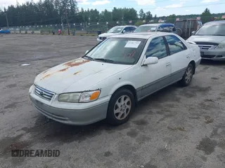 2001 Toyota Camry LE z VIN JT2BF22K310304712, wystawiony jako IAAI lot #42386743 z przebiegiem 103 552 mil mil oraz . Historia ofert i sprzedaży dostępna na DreamBid. Obrazek 2.