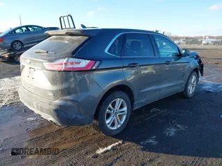 2019 Ford Edge SEL z VIN 2FMPK4J94KBB07837, wystawiony jako IAAI lot #41347294 z przebiegiem 90 668 mil mil oraz . Historia ofert i sprzedaży dostępna na DreamBid. Obrazek 4.