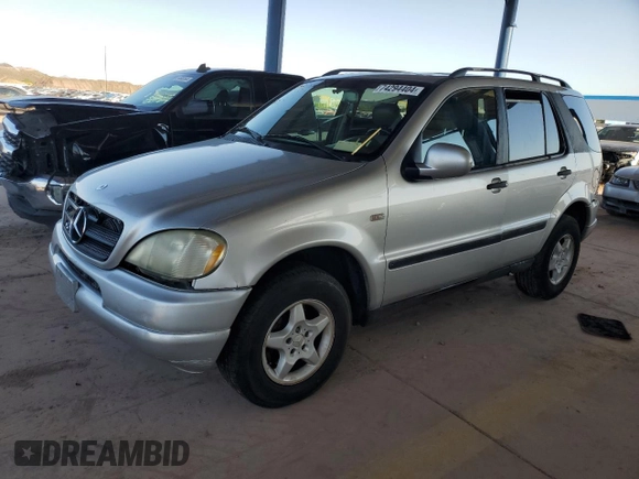 2000 Mercedes-Benz M-Class with VIN 4JGAB54E1YA193102, listed as a Copart auction lot 74294404 with 202,107 mi miles and Salvage Title. Bid and sale history available at carsss.com. Image 1.