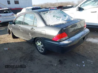 2002 Mitsubishi Lancer LS with VIN JA3AJ36E42U080614, listed as a IAAI auction lot 41397554 with 187,981 mi miles. Bid and sale history available at carsss.com. Image 3.