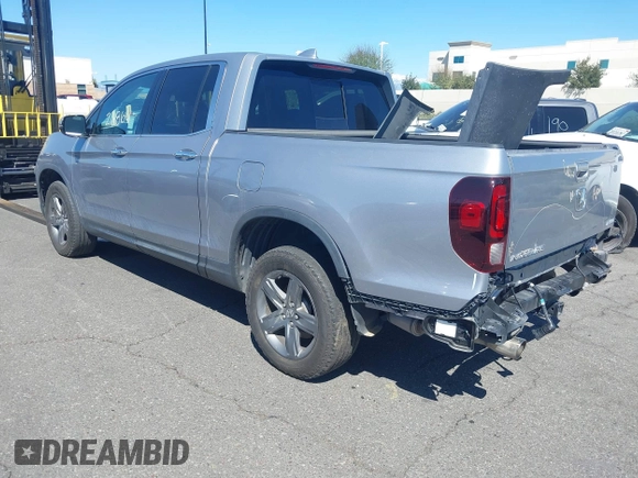 2022 Honda Ridgeline RTL-E with VIN 5FPYK3F78NB016045, listed as a IAAI auction lot 41626864 with 57,130 mi miles and . Bid and sale history available at DreamBid. Image 3.