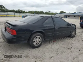 1997 Ford Thunderbird LX z VIN 1FALP62W7VH165149, wystawiony jako Copart lot #56654715 z przebiegiem 155 190 mil mil oraz Szkody całkowita. Historia ofert i sprzedaży dostępna na DreamBid. Obrazek 3.