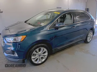 2020 Ford Edge Titanium z VIN 2FMPK3K91LBB37761, wystawiony jako IAAI lot #42829390 z przebiegiem 90 117 mil mil oraz . Historia ofert i sprzedaży dostępna na DreamBid. Obrazek 27.
