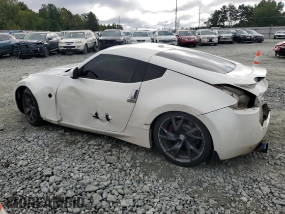 2013 Nissan 370Z with VIN JN1AZ4EH2DM381951, listed as a Copart auction lot 73913174 with 71,583 mi miles and Salvage Title. Bid and sale history available at carsss.com. Image 2.