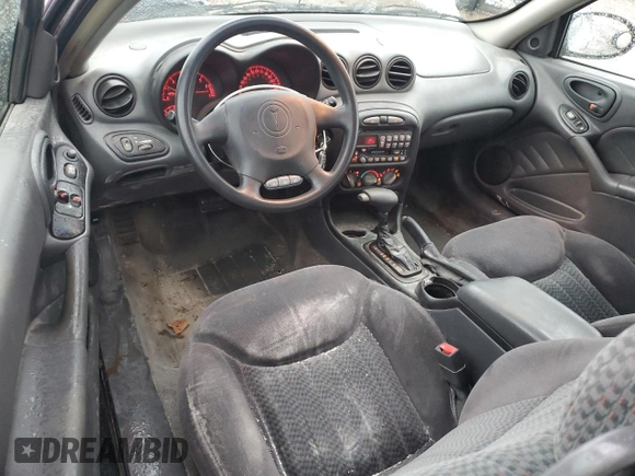 2002 Pontiac Grand Am with VIN 1G2NF12E82C261708, listed as a Copart auction lot 80855994 with 117,140 mi miles and Salvage title. Bid and sale history available at DreamBid. Image 8.