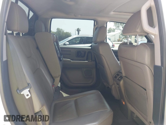 2012 Honda Ridgeline RTL z VIN 5FPYK1F57CB455267, wystawiony jako IAAI lot #42462296 z przebiegiem 186 451 mil mil oraz . Historia ofert i sprzedaży dostępna na DreamBid. Obrazek 8.