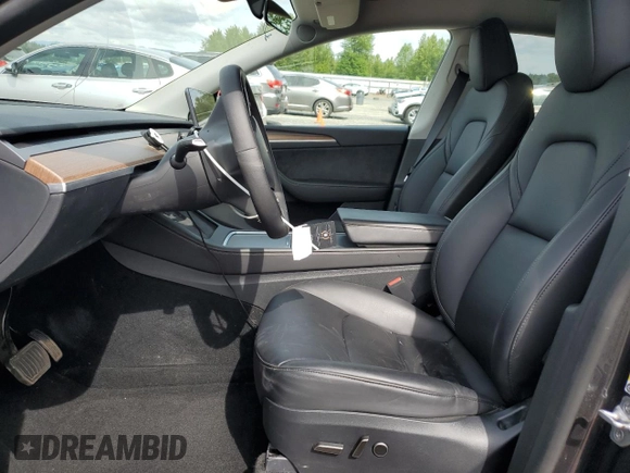 2024 Tesla Model Y Long Range z VIN 7SAYGDEE8RF986258, wystawiony jako Copart lot #58434275 z przebiegiem 59 934 mil mil oraz Szkoda całkowita • Salvage title. Historia ofert i sprzedaży dostępna na DreamBid. Obrazek 7.
