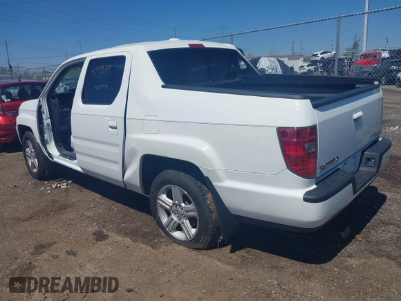 2009 Honda Ridgeline RTL with VIN 5FPYK16529B107871, listed as a IAAI auction lot 42049833 with 141,214 mi miles. Bid and sale history available at carsss.com. Image 3.