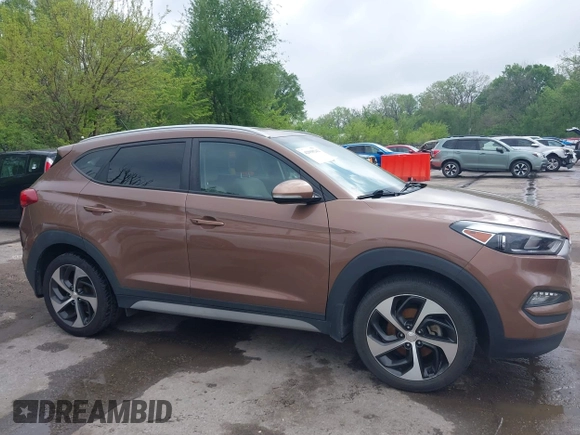 2017 Hyundai Tucson Value z VIN KM8J33A29HU389413, wystawiony jako IAAI lot #42098242 z przebiegiem 98 738 mil mil oraz . Historia ofert i sprzedaży dostępna na DreamBid. Obrazek 13.