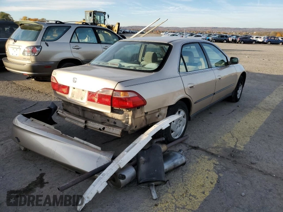 2000 Honda Accord LX z VIN 1HGCG1642YA084841, wystawiony jako Copart lot #72237974 z przebiegiem Nie podano mil oraz Szkoda całkowita • Salvage title. Historia ofert i sprzedaży dostępna na DreamBid. Obrazek 3.