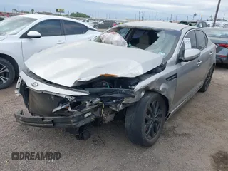 2015 Kia Optima LX with VIN 5XXGM4A70FG443696, listed as a IAAI auction lot 41962823 with 191,533 mi miles. Bid and sale history available at carsss.com. Image 2.