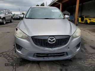 2013 Mazda CX-5 Sport z VIN JM3KE4BE4D0147672, wystawiony jako Copart lot #61617215 z przebiegiem 264 421 mil mil oraz Czysty tytuł • Clean title. Historia ofert i sprzedaży dostępna na DreamBid. Obrazek 5.