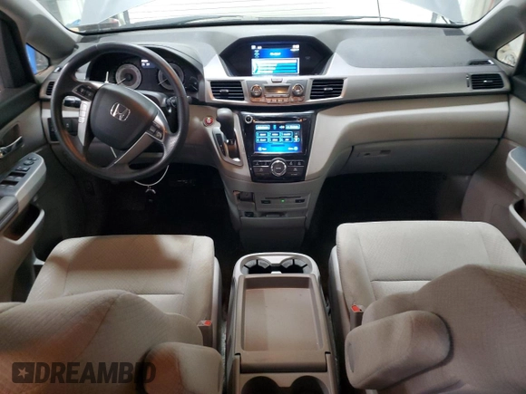 2016 Honda Odyssey SE with VIN 5FNRL5H31GB109718, listed as a Copart auction lot 54689915 with 48,933 mi miles and Salvage Title. Bid and sale history available at DreamBid. Image 8.