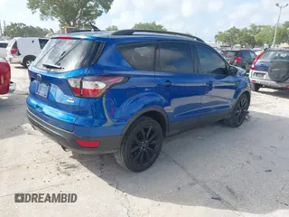 2018 Ford Escape SE z VIN 1FMCU0GD2JUC27271, wystawiony jako IAAI lot #41947047 z przebiegiem 154 672 mil mil oraz . Historia ofert i sprzedaży dostępna na DreamBid. Obrazek 4.