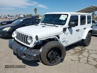 2024 Jeep Wrangler Sahara with VIN 1C4RJXP61RW126904, listed as a IAAI auction lot 41998215 with 32,034 mi miles and . Bid and sale history available at DreamBid. Image 2.