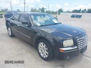 2007 Chrysler 300 Touring z VIN 2C3KA53G07H873513, wystawiony jako IAAI lot #42389450 z przebiegiem 250 625 mil mil oraz . Historia ofert i sprzedaży dostępna na DreamBid. Obrazek 1.