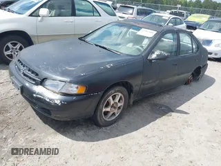 1999 Nissan Altima XE with VIN 1N4DL01DXXC193735, listed as a IAAI auction lot 41982408 with 153,008 mi miles. Bid and sale history available at carsss.com. Image 2.