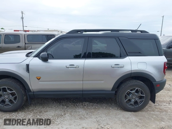 2021 Ford Bronco Sport Badlands z VIN 3FMCR9D99MRA67830, wystawiony jako IAAI lot #42318934 z przebiegiem 129 598 mil mil oraz . Historia ofert i sprzedaży dostępna na DreamBid. Obrazek 14.