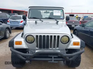 2005 Jeep Wrangler X z VIN 1J4FA39S95P370868, wystawiony jako IAAI lot #42476186 z przebiegiem 144 986 mil mil oraz . Historia ofert i sprzedaży dostępna na DreamBid. Obrazek 6.