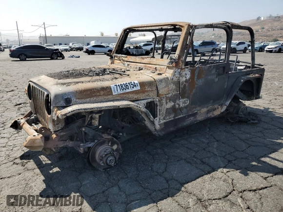 1999 Jeep Wrangler Sahara with VIN 1J4FY49SXXP473446, listed as a Copart auction lot 71836154 with 0 mi miles and Non Repairable. Bid and sale history available at carsss.com. Image 1.